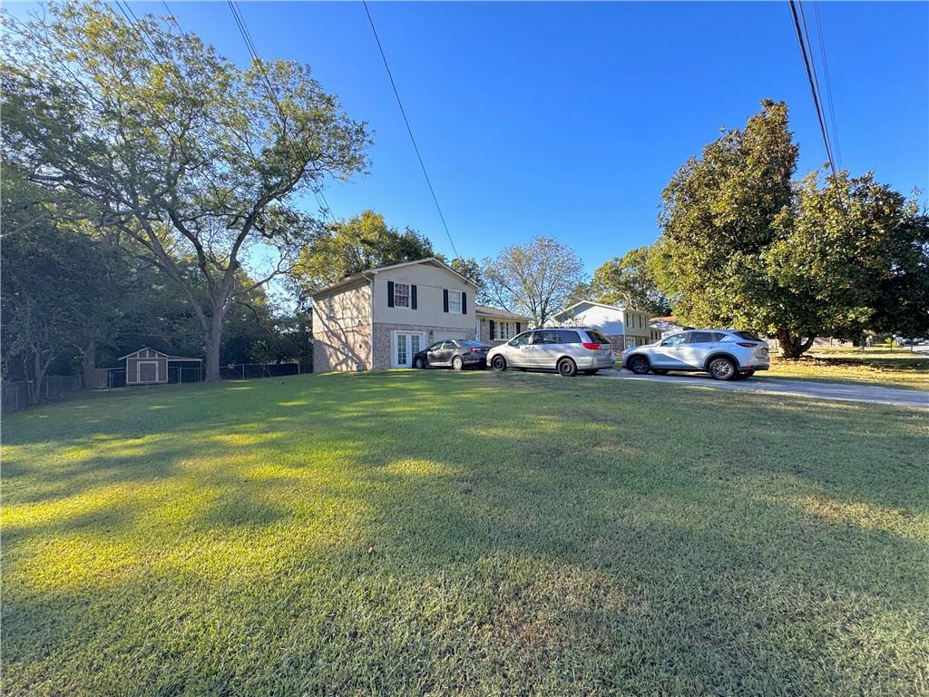 1825 North Road Snellville, GA 30078 - Photo 40 of 43 a view of a house with a big yard