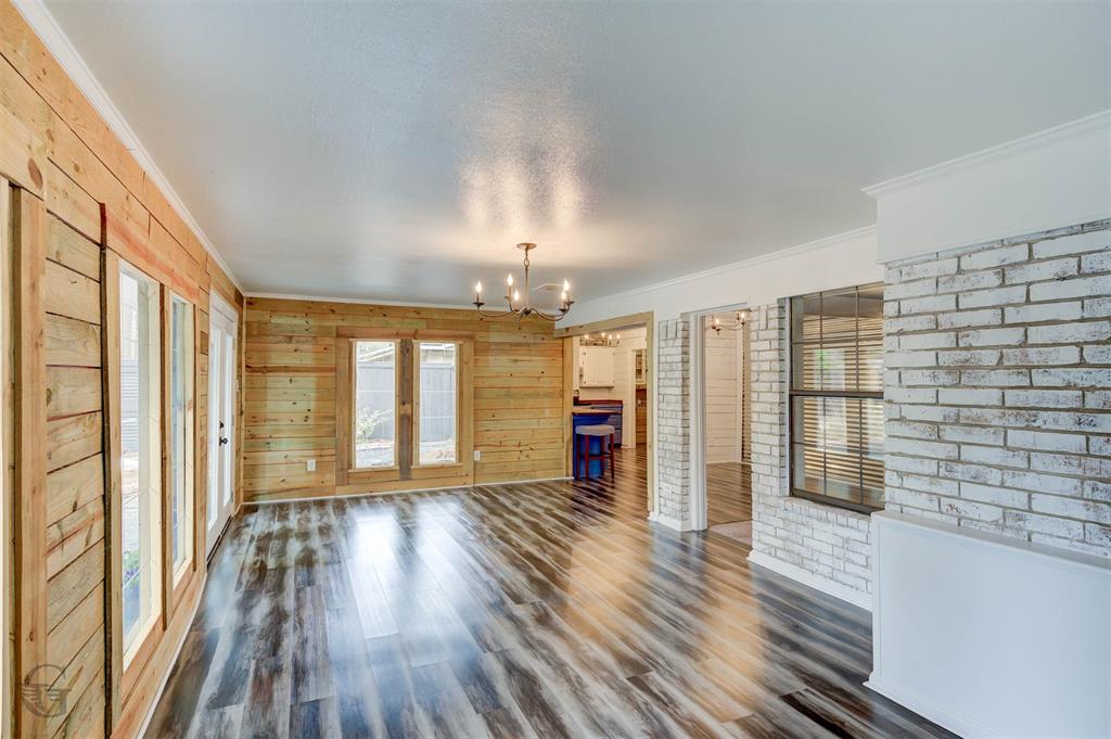 211 Chimney Lane Haughton, LA 71037 - Photo 11 of 35 wooden floor in an empty room with a window