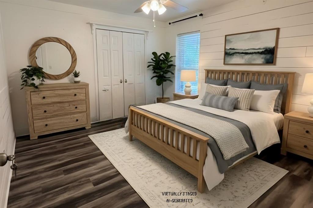 211 Chimney Lane Haughton, LA 71037 - Photo 17 of 35 a bedroom with a bed and a chandelier
