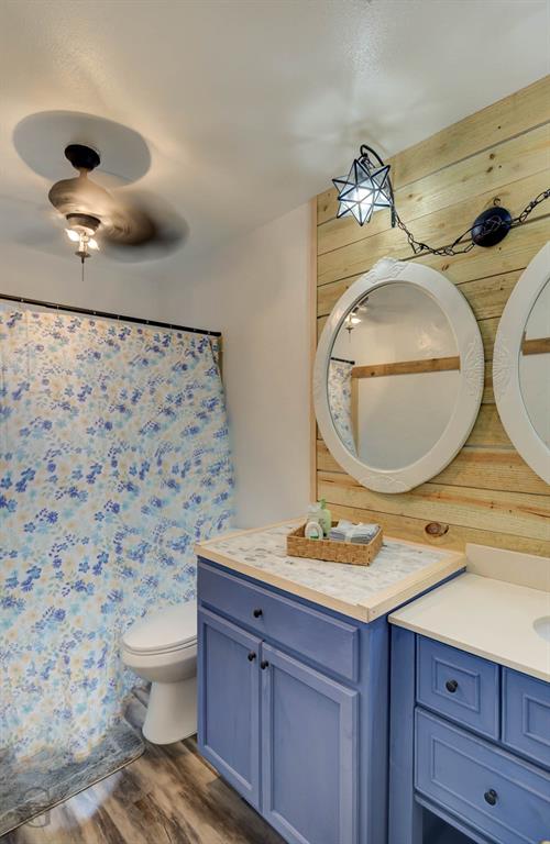211 Chimney Lane Haughton, LA 71037 - Photo 21 of 35 a bathroom with a sink mirror vanity and toilet