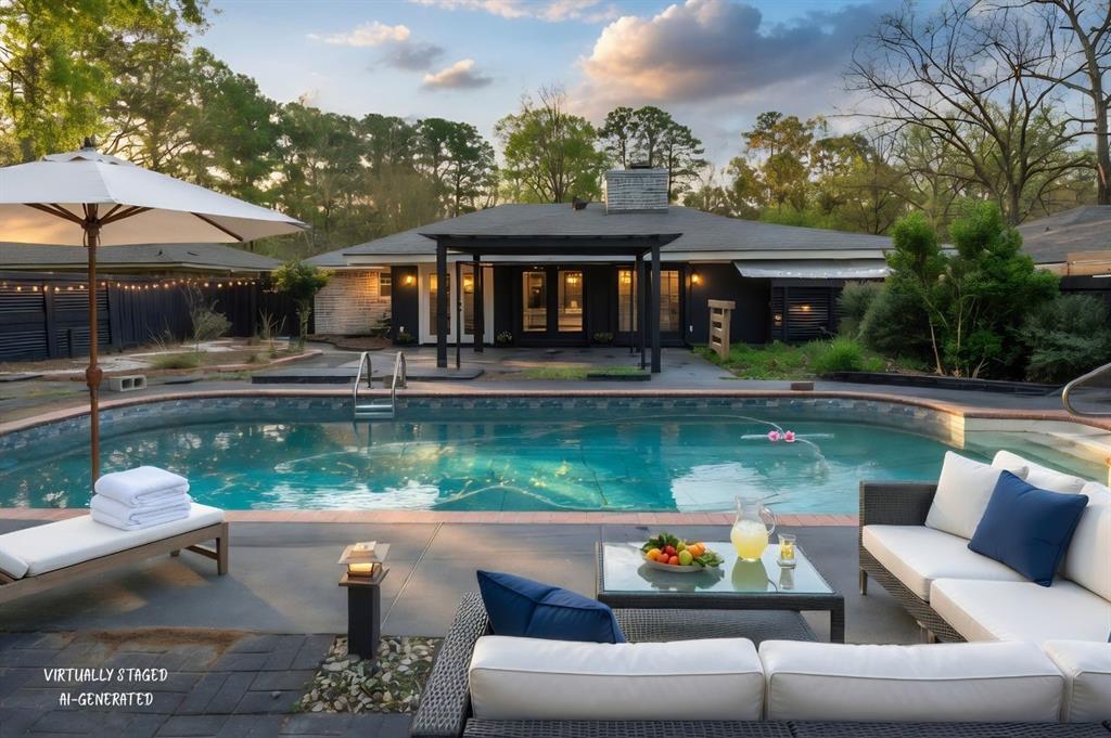 211 Chimney Lane Haughton, LA 71037 - Photo 26 of 35 an outdoor sitting area with furniture and a lake view