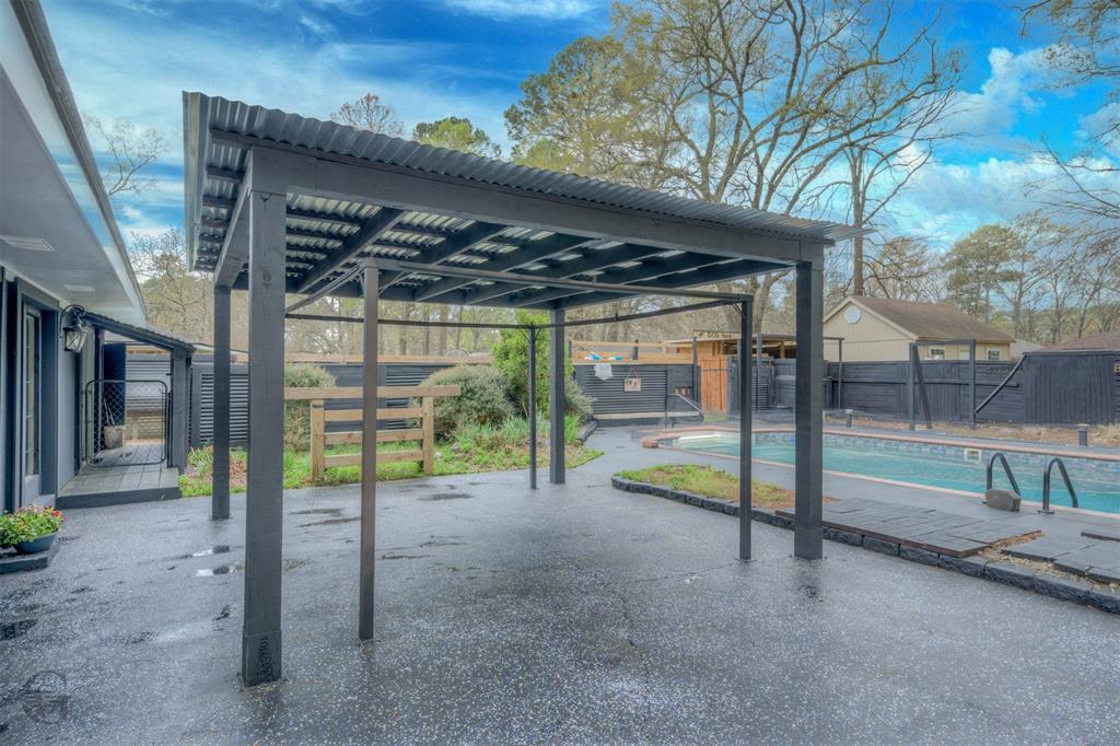 211 Chimney Lane Haughton, LA 71037 - Photo 30 of 35 a view of swimming pool with a backyard