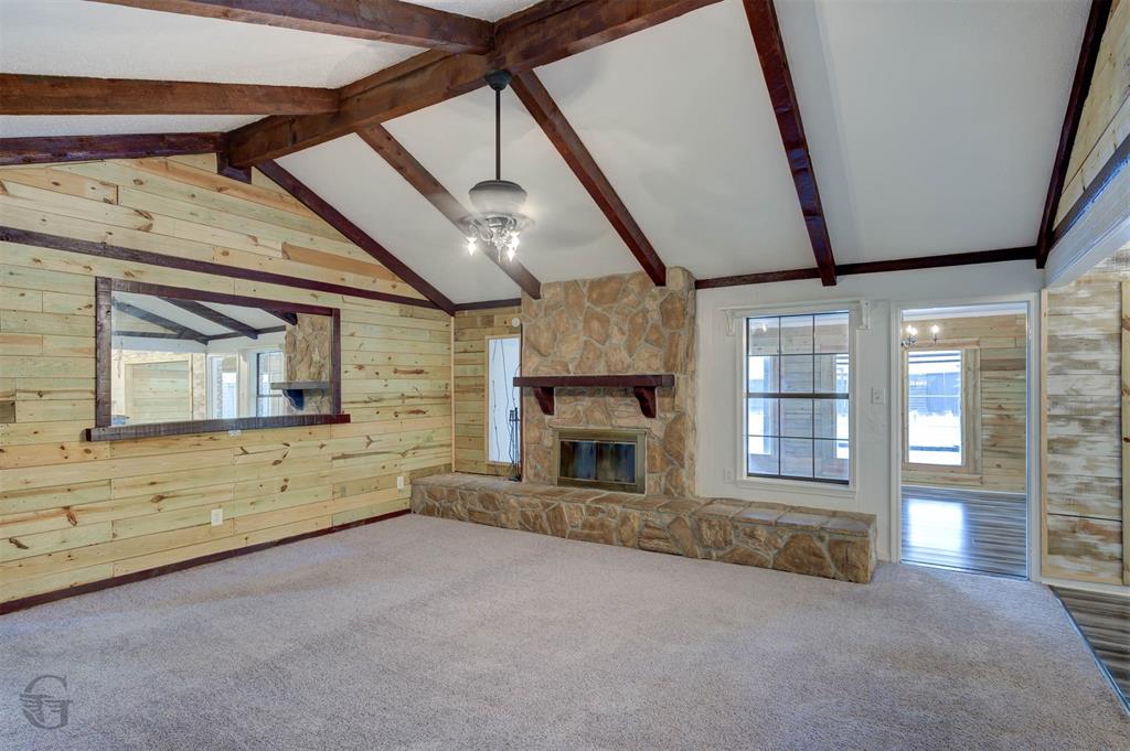 211 Chimney Lane Haughton, LA 71037 - Photo 3 of 35 a view of an empty room with a fireplace and wooden floor
