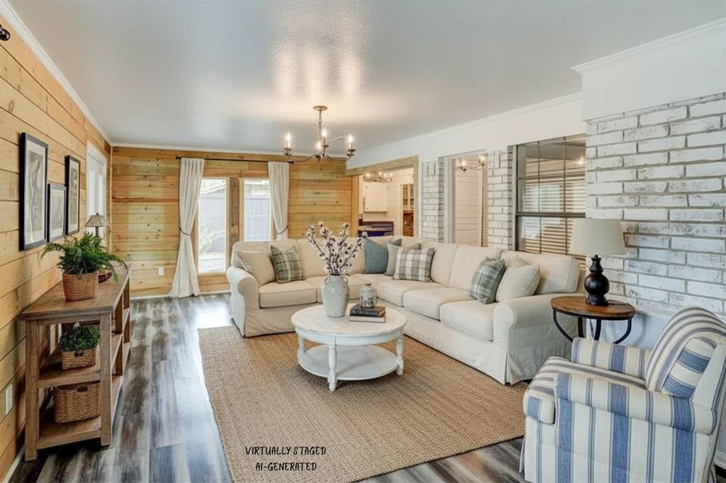 211 Chimney Lane Haughton, LA 71037 - Photo 10 of 35 a living room with furniture and a chandelier