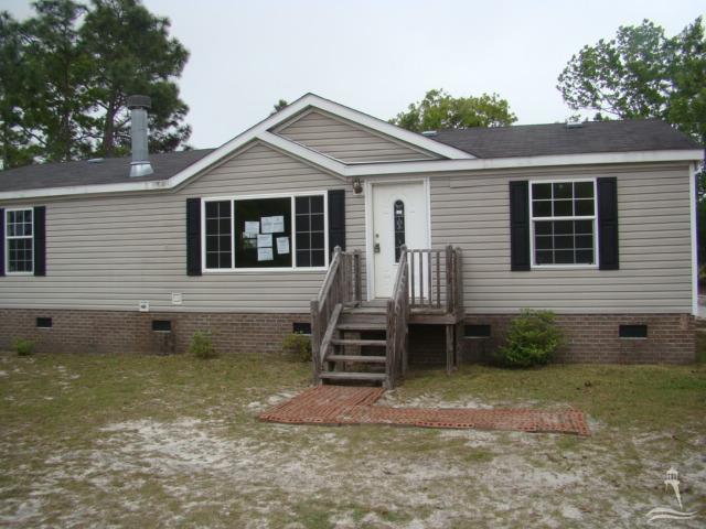 581 Lumbee Road Southport, NC 28461 - Photo 1 of 8 Primary Photo