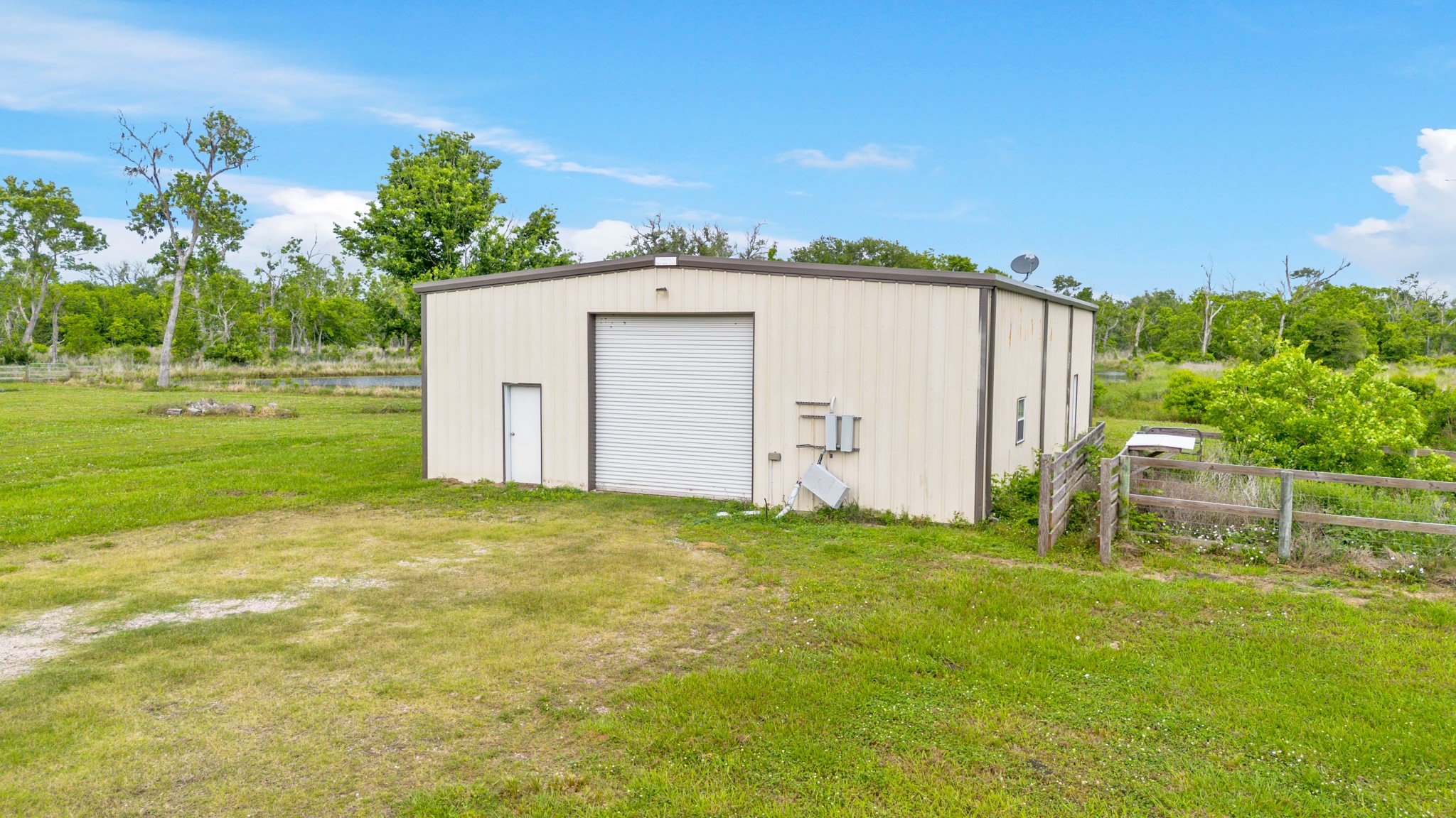 14067 County Road 809 Sweeny, TX 77480 - Photo 4 of 12 a house with a yard