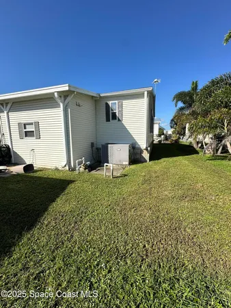 $245,000 | 504 Puffin Drive, Barefoot Bay, FL 32976