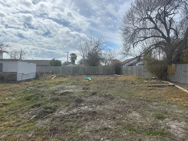 a view of a yard covered with snow in the yard