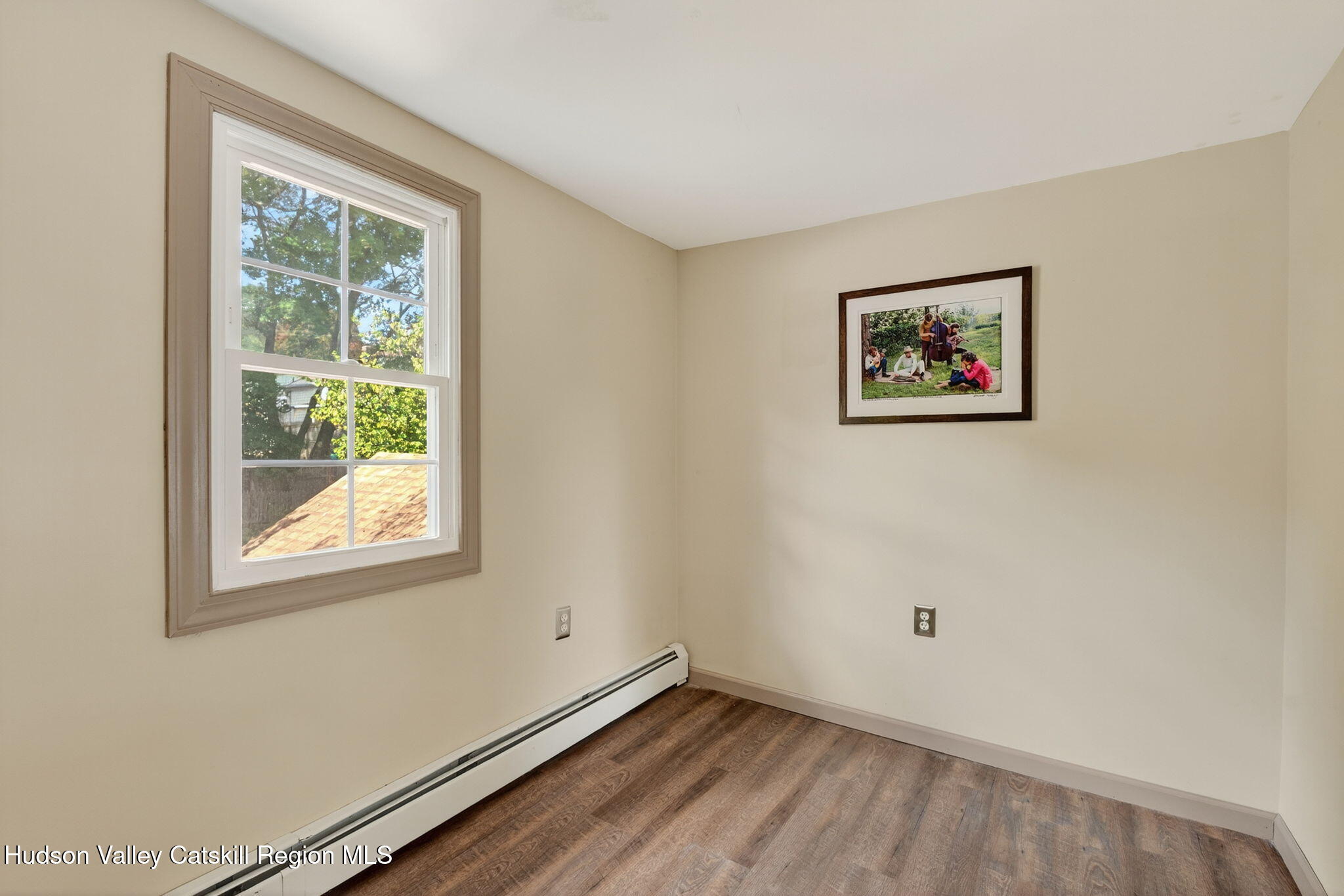 89 Spring Street Kingston, NY 12401 - Photo 16 of 24 an empty room with a window