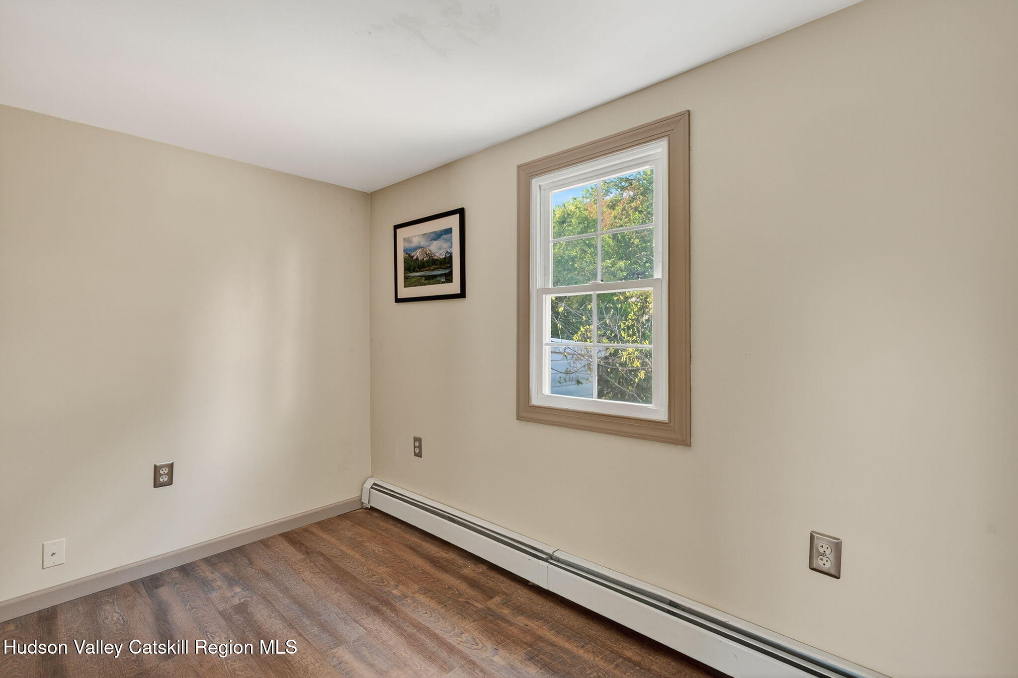 89 Spring Street Kingston, NY 12401 - Photo 17 of 24 an empty room with a window