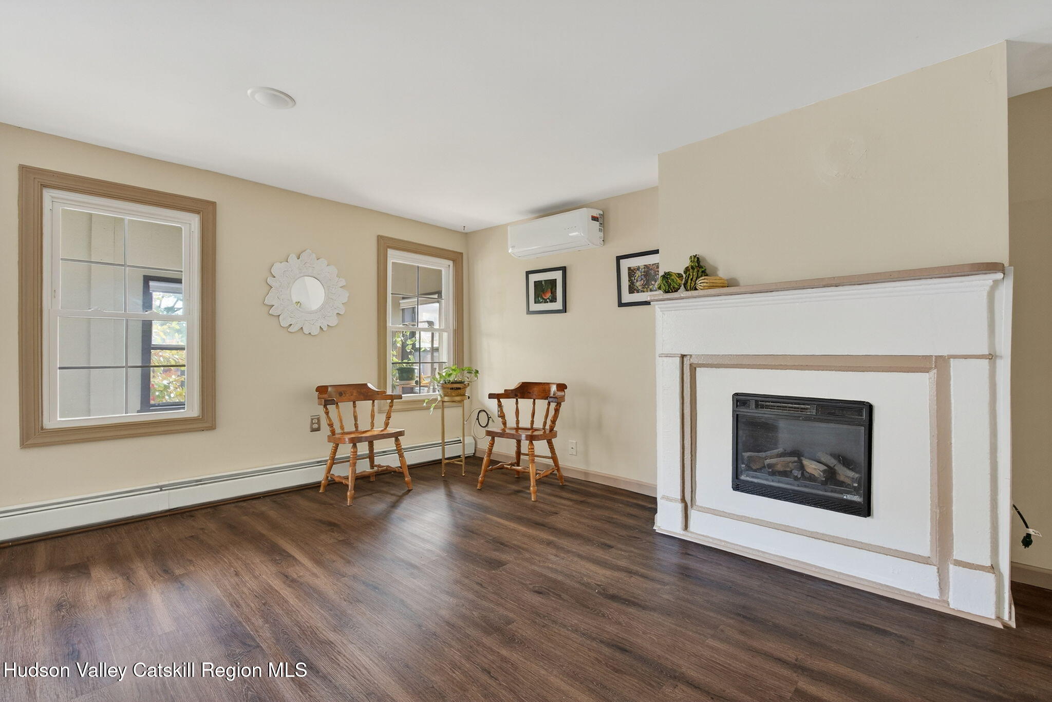 89 Spring Street Kingston, NY 12401 - Photo 3 of 24 a living room with furniture and a fireplace