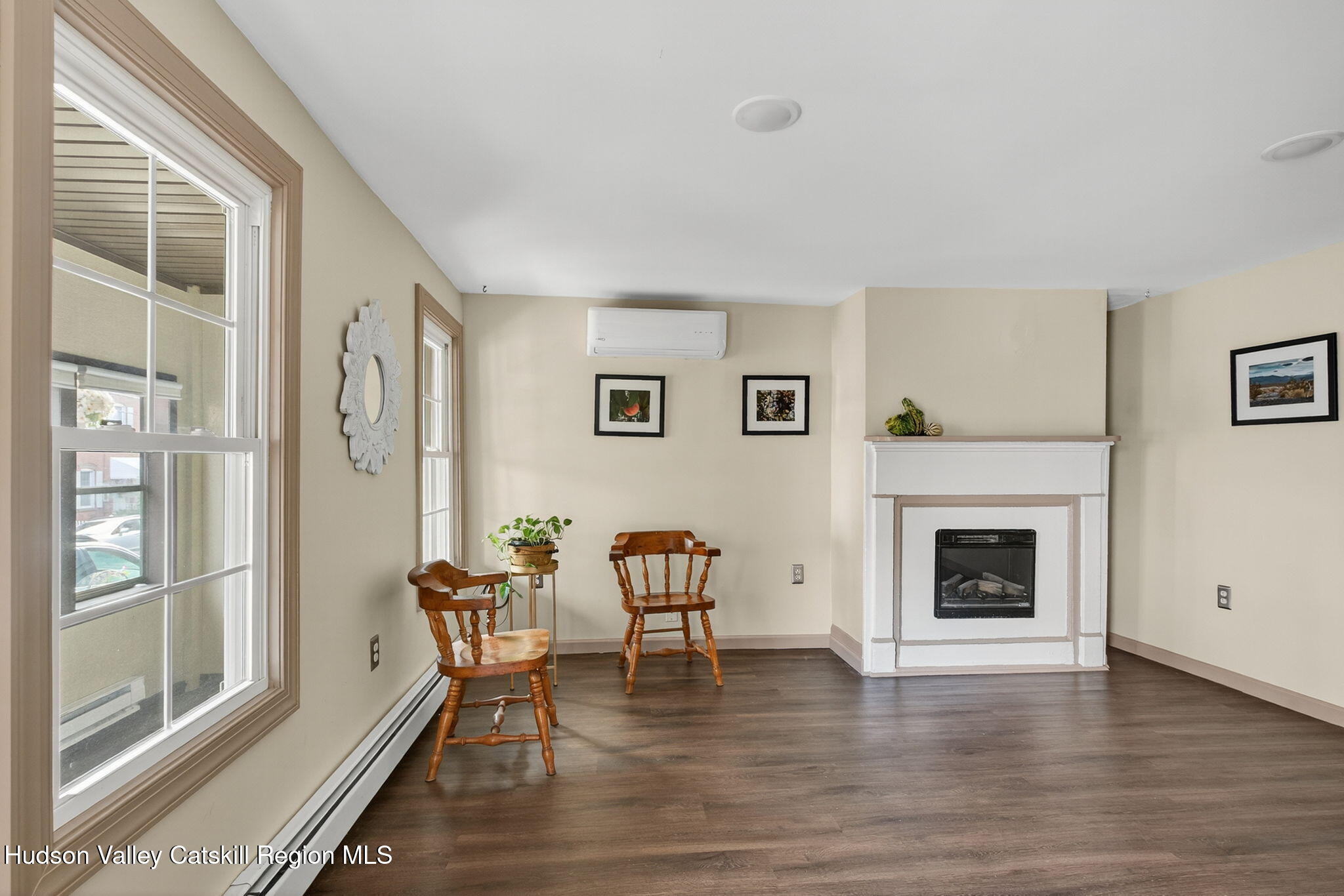 89 Spring Street Kingston, NY 12401 - Photo 4 of 24 a living room with furniture and a fireplace