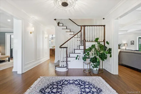 a view of entryway with wooden floor