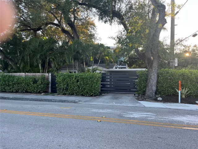 a house view with a garden space