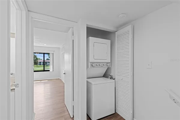 a view of bathroom with a washer and dryer