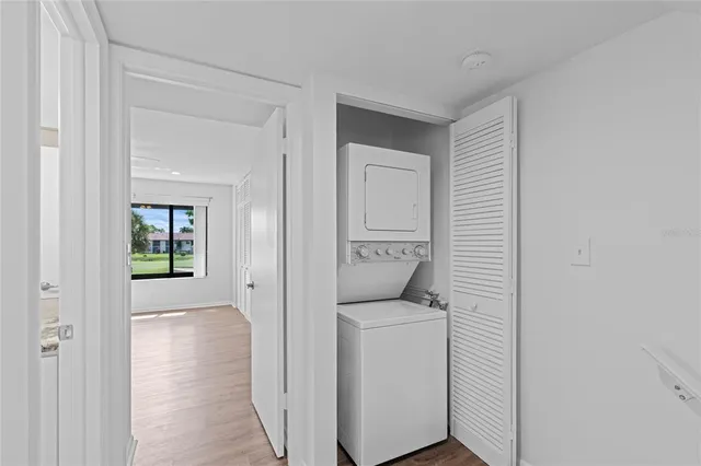 a view of bathroom with a washer and dryer