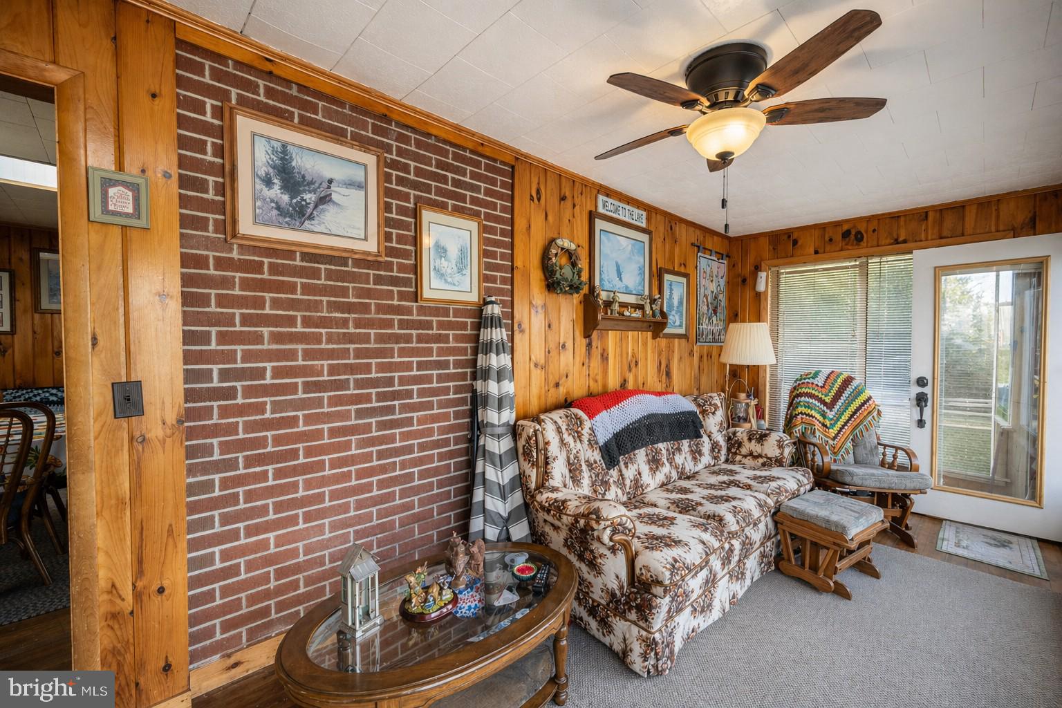 682 Marsh Hill Road McHenry, MD 21541 - Photo 11 of 40 a bedroom with a bed and a chandelier