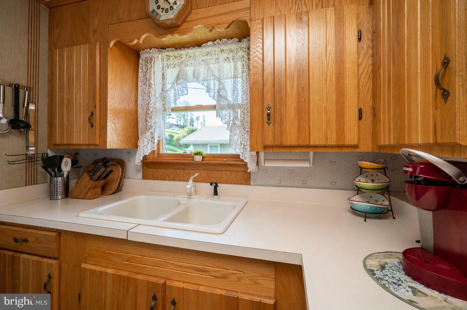 682 Marsh Hill Road McHenry, MD 21541 - Photo 16 of 40 a kitchen with a sink and a window