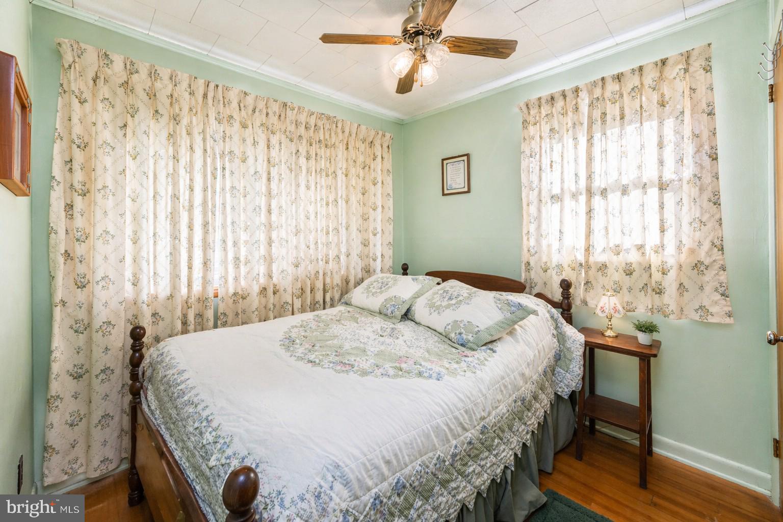 682 Marsh Hill Road McHenry, MD 21541 - Photo 23 of 40 a bedroom with a bed and a window