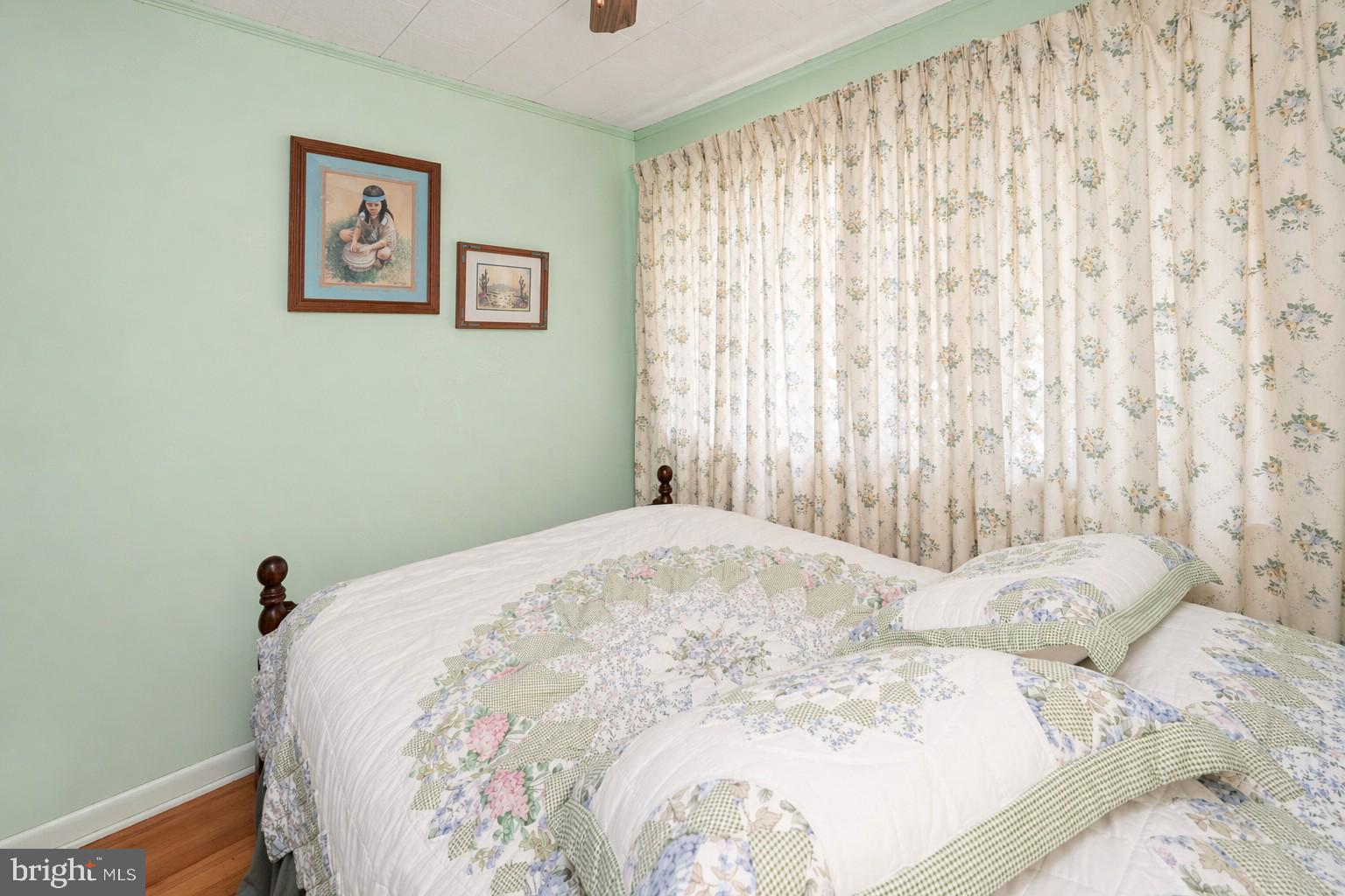 682 Marsh Hill Road McHenry, MD 21541 - Photo 25 of 40 a bedroom with a bed and a window