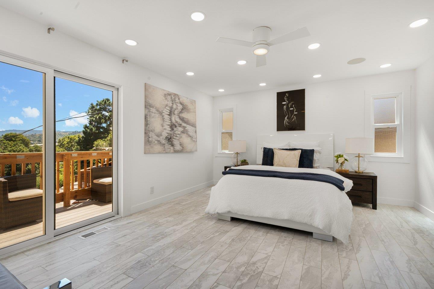 2 Ensenada Road San Carlos, CA 94070 - Photo 11 of 31 a spacious bedroom with a bed and glass door