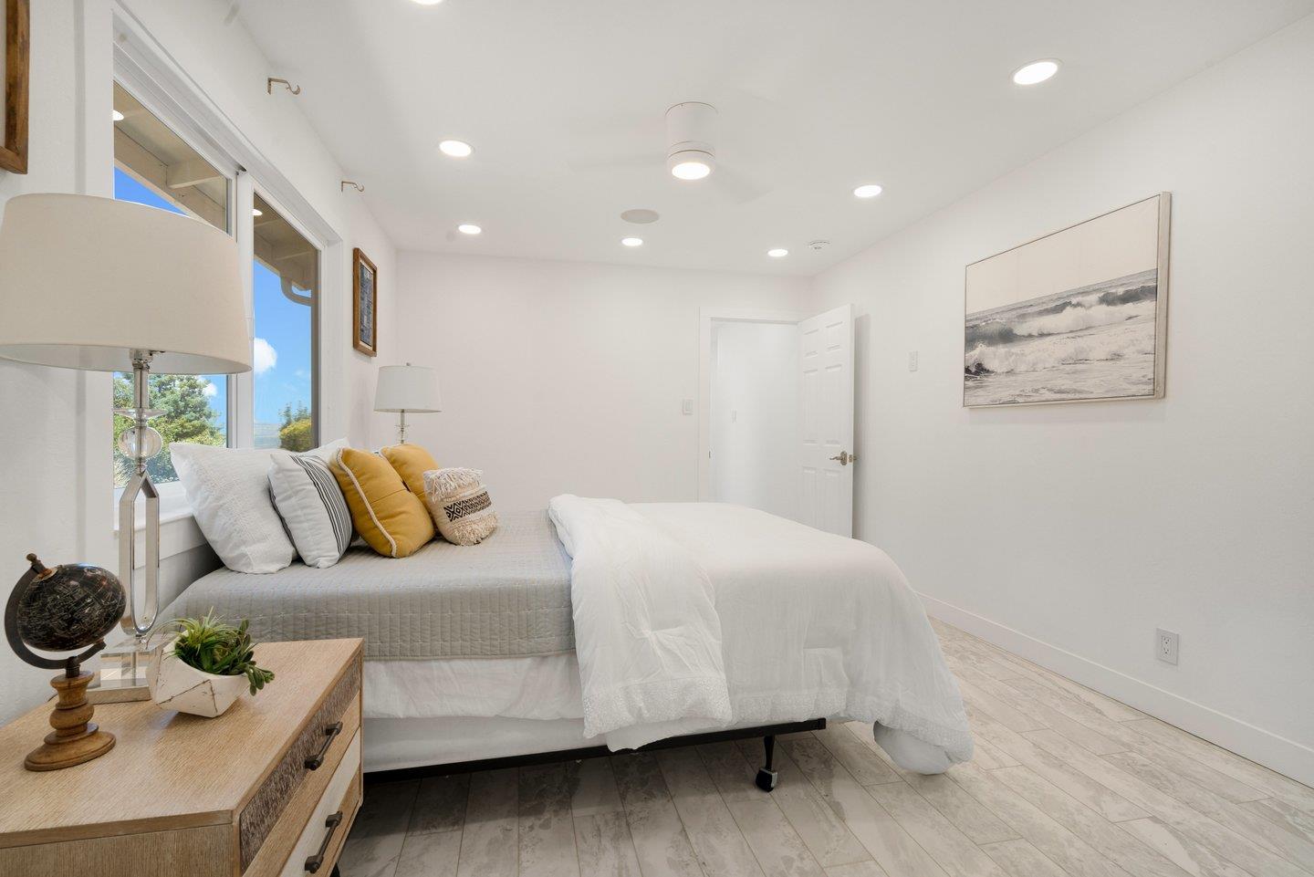 2 Ensenada Road San Carlos, CA 94070 - Photo 15 of 31 a bedroom with a bed and wooden floor