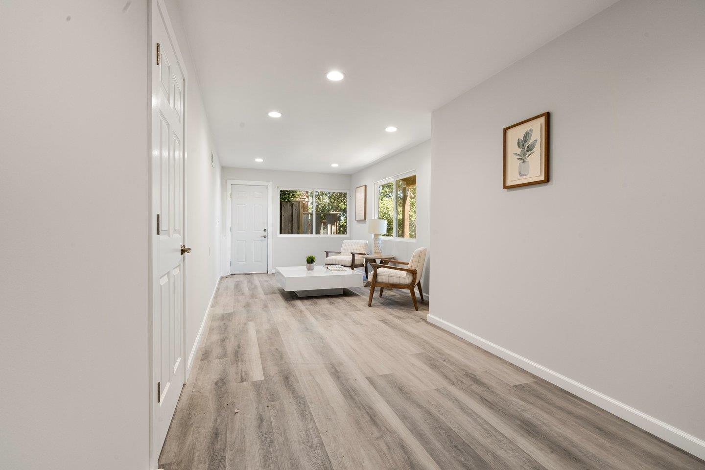 2 Ensenada Road San Carlos, CA 94070 - Photo 18 of 31 a living room with furniture and a wooden floor