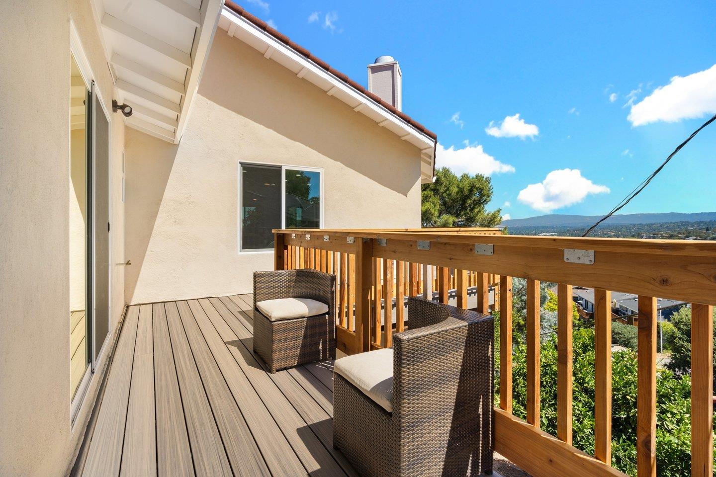 2 Ensenada Road San Carlos, CA 94070 - Photo 23 of 31 a balcony with wooden floor