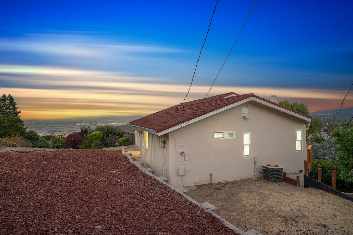 2 Ensenada Road San Carlos, CA 94070 - Photo 31 of 31 a front view of a house with a yard