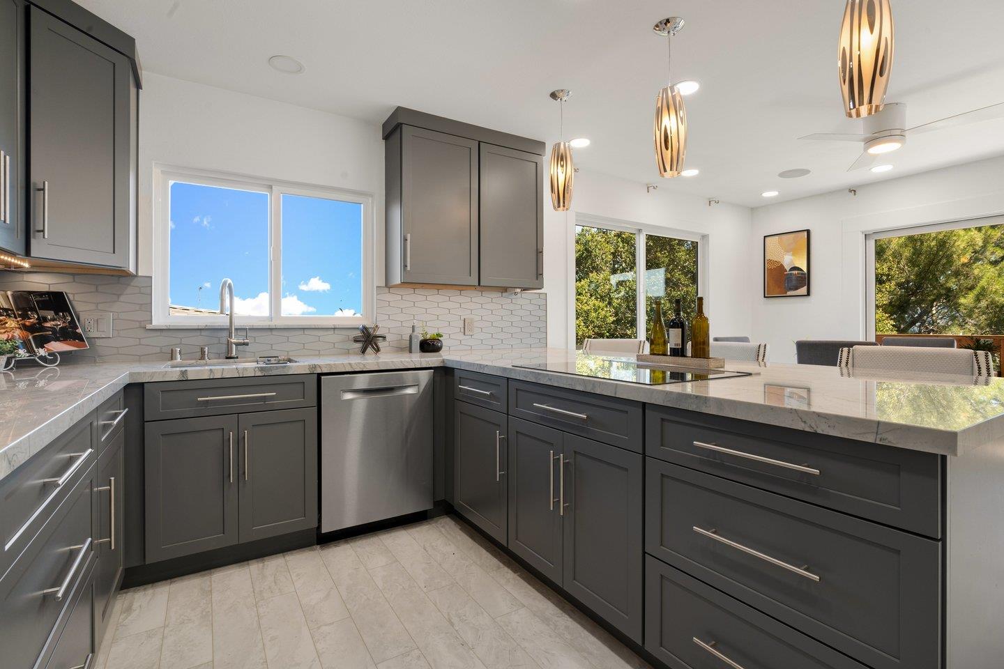 2 Ensenada Road San Carlos, CA 94070 - Photo 6 of 31 a kitchen with a sink cabinets and window