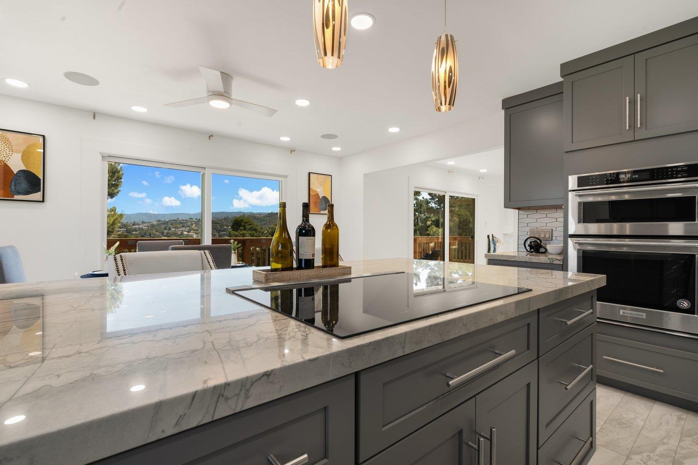 2 Ensenada Road San Carlos, CA 94070 - Photo 9 of 31 a view of counter top space with stainless steel appliances