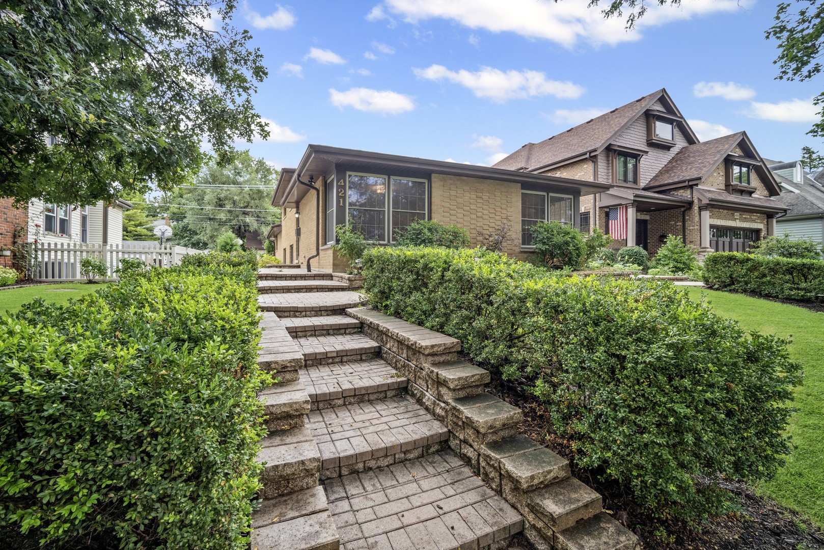 421 North Elm Street Itasca, IL 60143 - Photo 19 of 21 a front view of a house with a yard