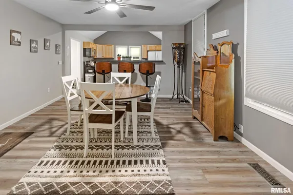 a view of a dining room with furniture