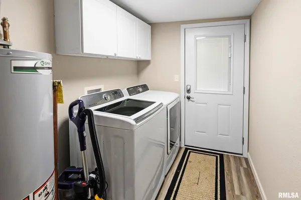 a kitchen with stainless steel appliances a stove sink and cabinets