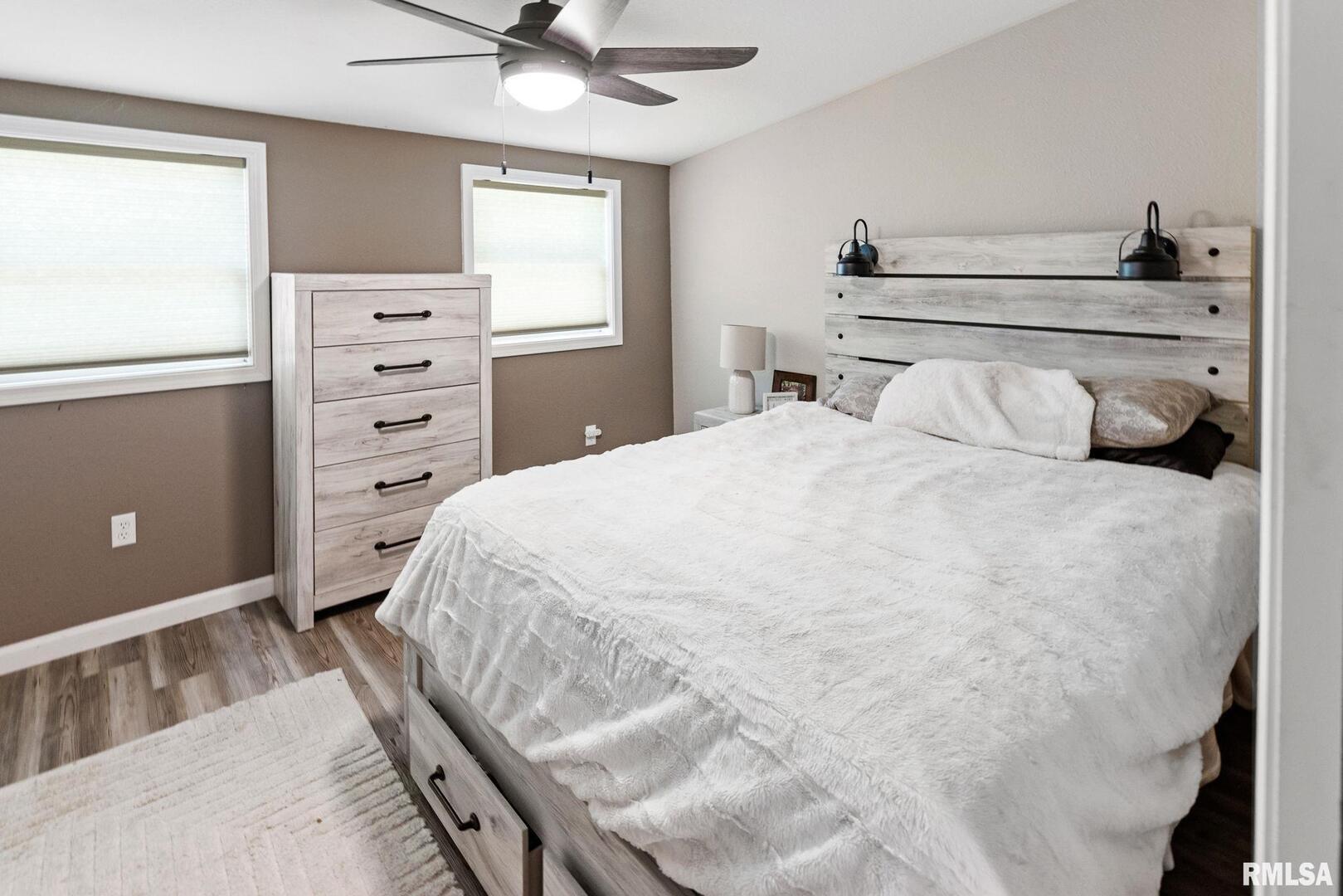 416 South Maple Street Salem, IL 62881 - Photo 23 of 31 a bedroom with a bed and a window