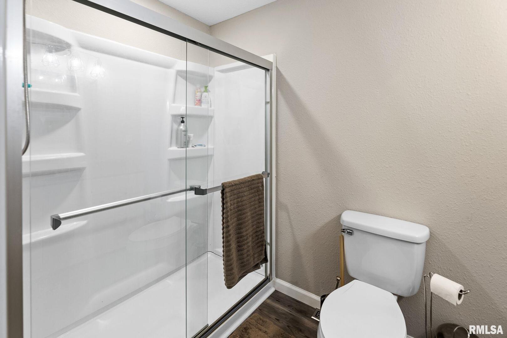 416 South Maple Street Salem, IL 62881 - Photo 26 of 31 a white toilet sitting next to a bathroom sink