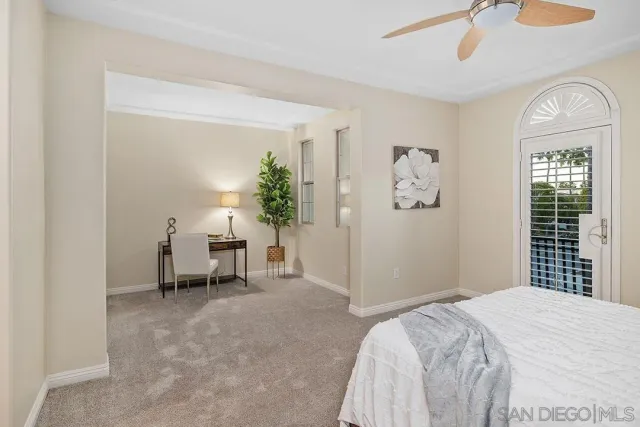 a bathroom with a double vanity sink mirror and cabinets