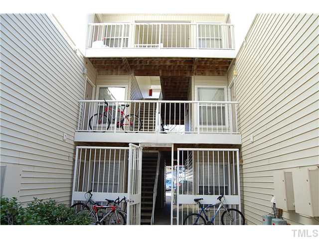1500 Graduate Lane, Unit 104 Raleigh, NC 27606 - Photo 5 of 15 a view of front of house with a balcony
