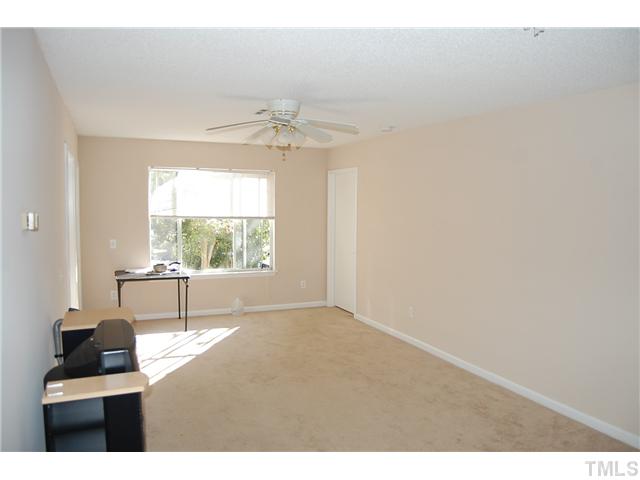 1500 Graduate Lane, Unit 104 Raleigh, NC 27606 - Photo 10 of 15 a view of an empty room with a window