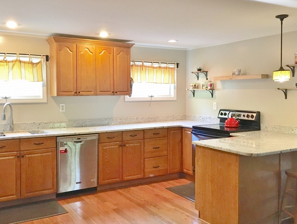 2 Stony Hill Road Holland, MA 01521 - Photo 5 of 24 a kitchen with granite countertop cabinets sink and a granite counter top