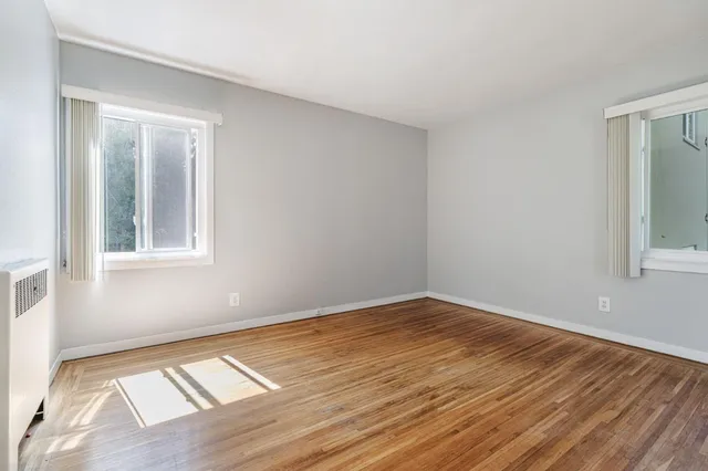 a view of an empty room and window