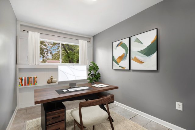 231 West 35th Street Steger, IL 60475 - Photo 7 of 17 a view of a workspace room with furniture window and wooden floor