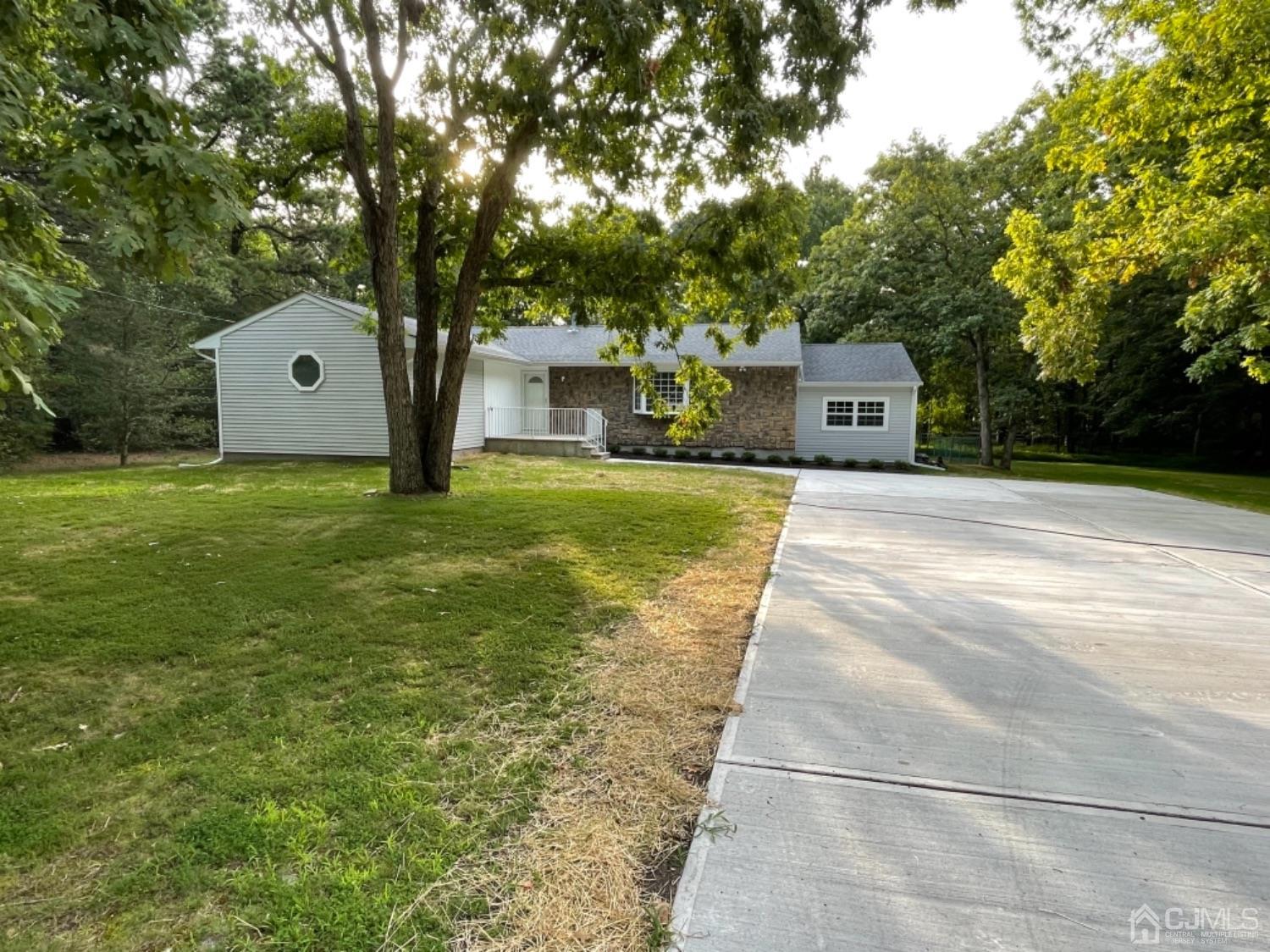 115 Old Forge Road Monroe Township, NJ 08831 - Photo 2 of 38 New doublewide concrete driveway