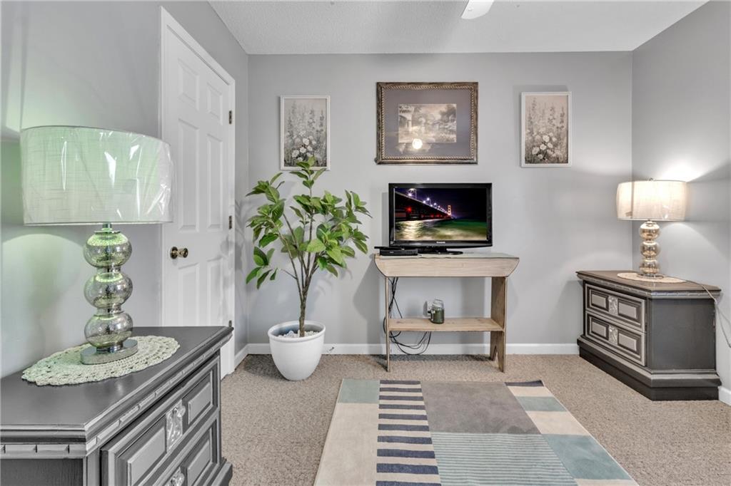 12 Ranger Road Southeast Cartersville, GA 30121 - Photo 19 of 51 a view of a livingroom with furniture and a fireplace