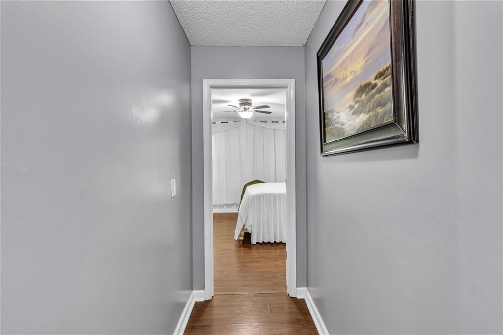 12 Ranger Road Southeast Cartersville, GA 30121 - Photo 22 of 51 a view of a hallway with wooden floor and cabinet