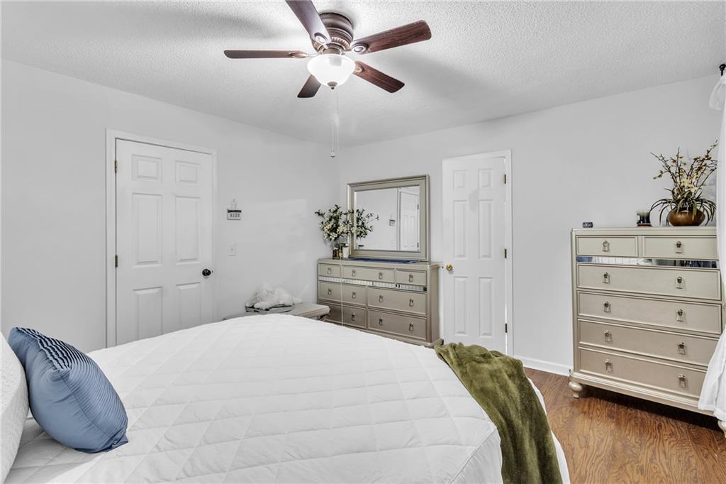 12 Ranger Road Southeast Cartersville, GA 30121 - Photo 25 of 51 a bedroom with a bed and closet