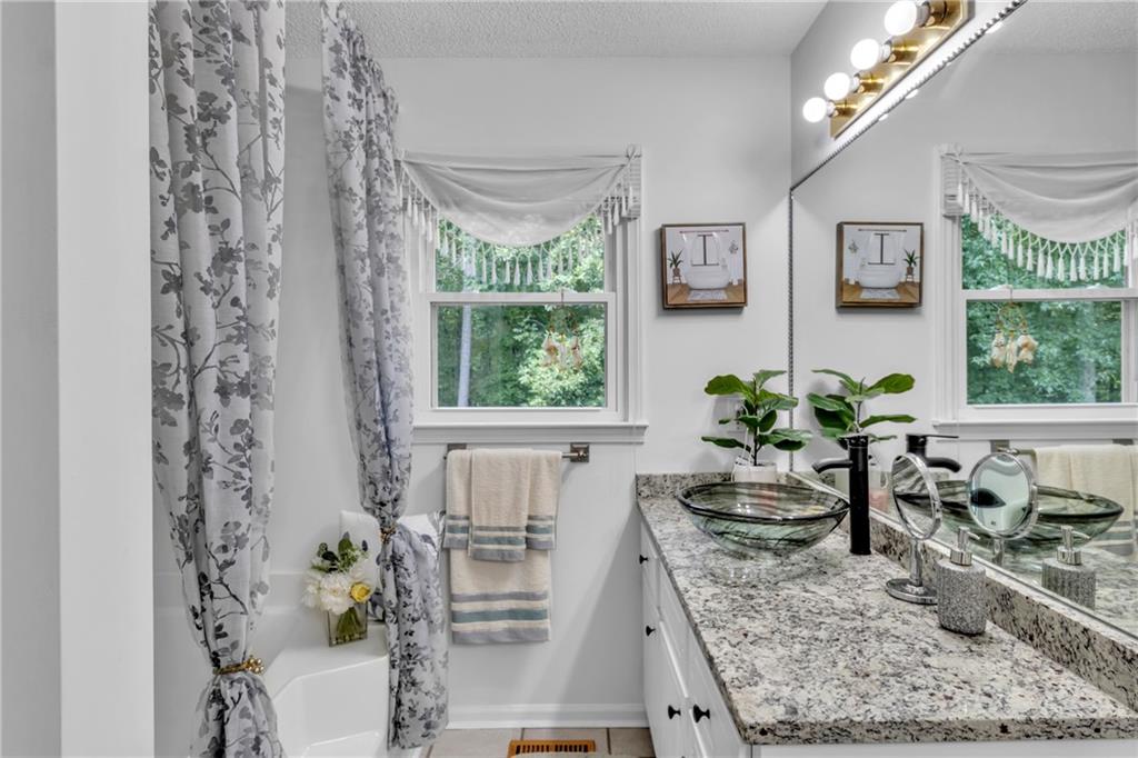12 Ranger Road Southeast Cartersville, GA 30121 - Photo 27 of 51 a view of a living room and dining room