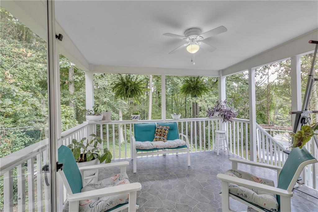 12 Ranger Road Southeast Cartersville, GA 30121 - Photo 30 of 51 a living room with large windows and furniture