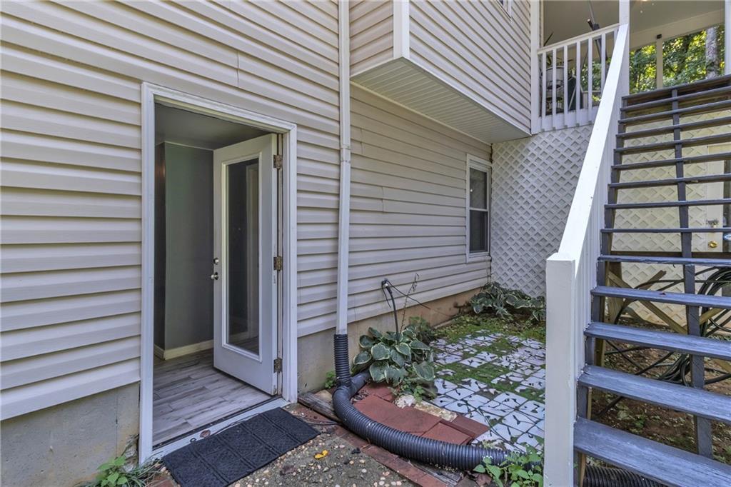 12 Ranger Road Southeast Cartersville, GA 30121 - Photo 36 of 51 a view of a house with a door and wooden walls