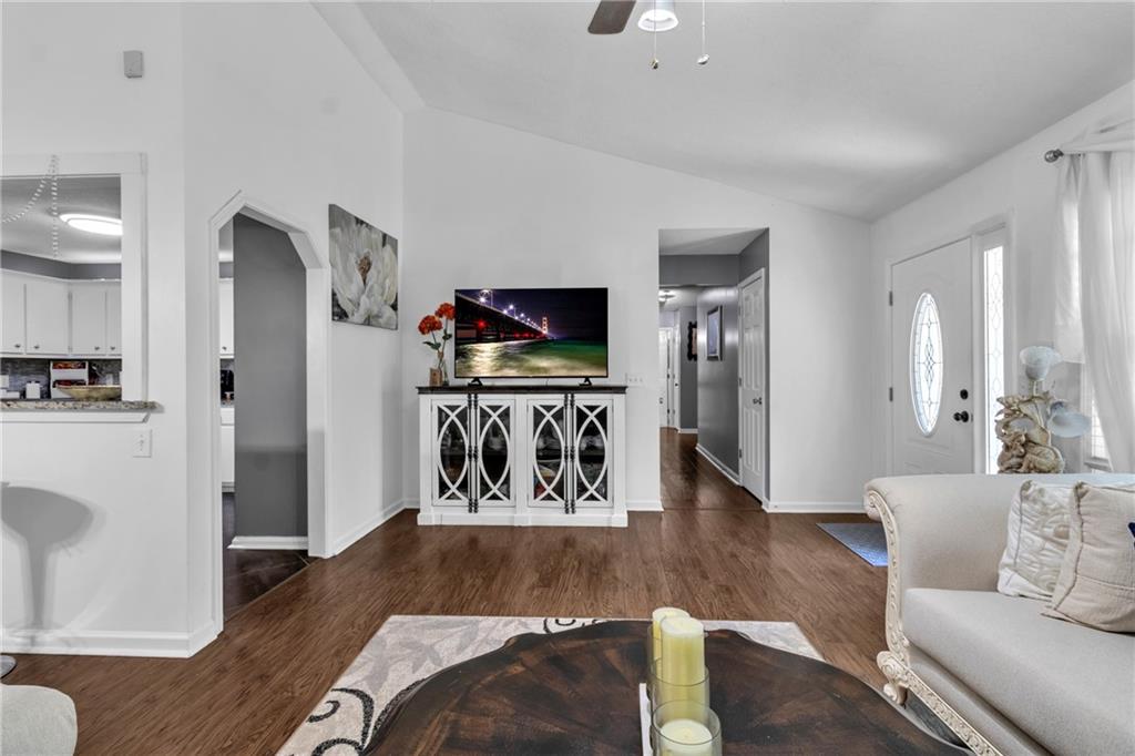 12 Ranger Road Southeast Cartersville, GA 30121 - Photo 9 of 51 a living room with furniture and a wooden floor